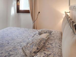 Posteľ alebo postele v izbe v ubytovaní Holiday Home Omer by Interhome