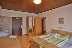 Cama o camas de una habitación en Gasthof Bader