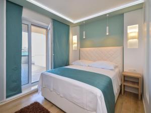Posteľ alebo postele v izbe v ubytovaní Apartment Mornar-5 by Interhome