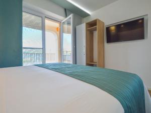 Posteľ alebo postele v izbe v ubytovaní Apartment Mornar-5 by Interhome