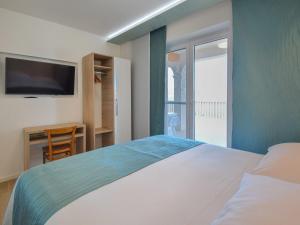Posteľ alebo postele v izbe v ubytovaní Apartment Mornar-5 by Interhome