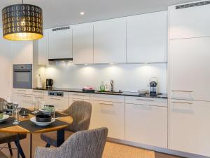 Kuchyň nebo kuchyňský kout v ubytování Apartment Verena by Interhome
