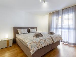 Postel nebo postele na pokoji v ubytování Apartment Verena by Interhome