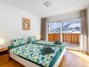 A bed or beds in a room at Apartment Verena by Interhome