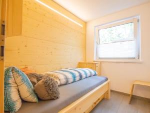 Ένα ή περισσότερα κρεβάτια σε δωμάτιο στο Apartment Anette Living by Interhome