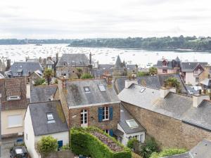an aerial view of a town with houses and the water at Apartment Ker Louis 2 by Interhome in Dinard