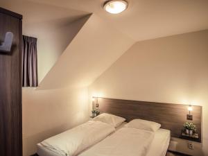 Postelja oz. postelje v sobi nastanitve Holiday Home Residence Lipno-1 by Interhome