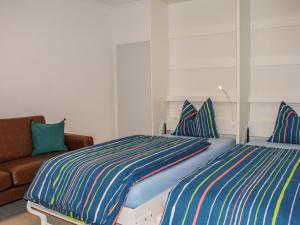 Un pat sau paturi într-o cameră la Apartment Casa Barbara by Interhome