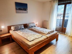 A bed or beds in a room at Apartment Anna by Interhome