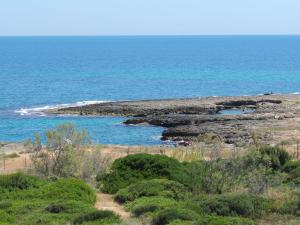 an island in the middle of the ocean at Holiday Home Happy Premium by Interhome in Torre Santa Sabina