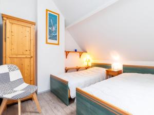 Ένα ή περισσότερα κρεβάτια σε δωμάτιο στο Apartment Belle vue Mer et Piscine by Interhome