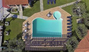 an overhead view of a swimming pool at Sunday Resort in Gerakini