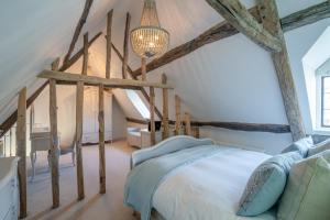 Yew Tree Cottage tesisinde bir odada yatak veya yataklar