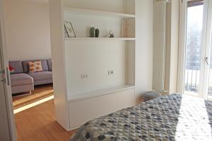 Ένα ή περισσότερα κρεβάτια σε δωμάτιο στο Luxuryhouse Boboetto