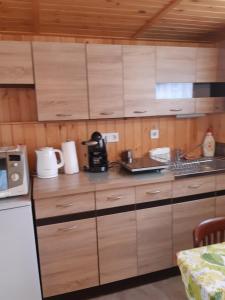 Kuchyňa alebo kuchynka v ubytovaní Mátyás Apartman