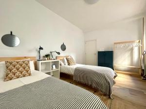 Voodi või voodid majutusasutuse Trauko Flat Parking 12 euros x day EBI01313 toas