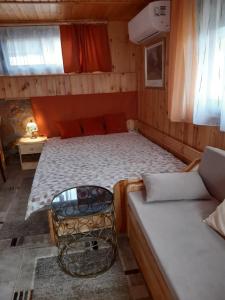 Posteľ alebo postele v izbe v ubytovaní Mátyás Apartman