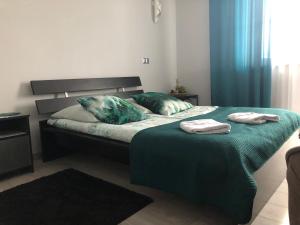 Łóżko lub łóżka w pokoju w obiekcie Hotel Restauracja U Guta
