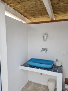 Salle de bains dans l'établissement I trulli di Uma