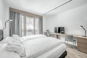 Letto o letti in una camera di all inclusive Hotel Lohmann