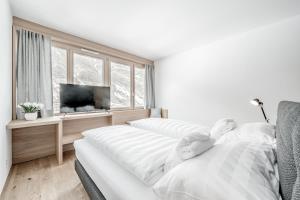Letto o letti in una camera di all inclusive Hotel Lohmann