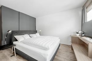 Letto o letti in una camera di all inclusive Hotel Lohmann
