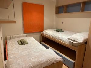 Ένα ή περισσότερα κρεβάτια σε δωμάτιο στο Bernabé Soriano 2