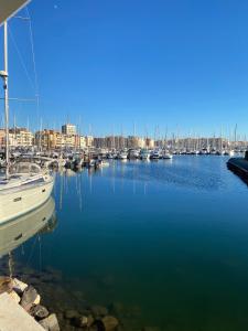 a group of boats docked in a harbor at Vue sur l’eau in Cap d'Agde