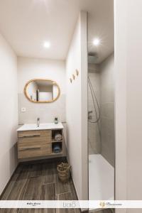 a bathroom with a sink and a shower at La parenthèse du Tourmalet - séjour tout compris - draps et ménage inclus- in Luz-Saint-Sauveur +57 photos