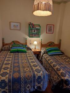 Tempat tidur dalam kamar di Casa Alpujarreña Fina Número 27