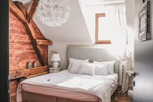 Voodi või voodid majutusasutuse Penzion Adamův Dvůr toas