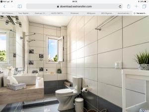 Koupelna v ubytování Filippos Apartments