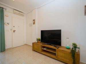 A television and/or entertainment centre at Costa Blanca View Retreat