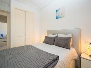 A bed or beds in a room at Costa Blanca View Retreat