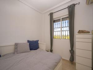 A bed or beds in a room at Costa Blanca View Retreat