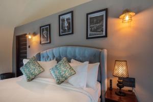 מיטה או מיטות בחדר ב-Dream Cliff Mountain Resort