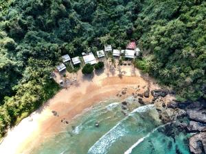 an aerial view of a beach with a group of people at Duli Beach Resort in El Nido