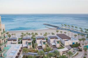 an aerial view of the beach and resort at Luxurious 5 Bedroom Apartment - Full Ocean view in Al Aqah