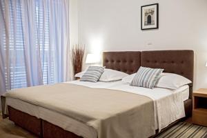 Posteľ alebo postele v izbe v ubytovaní Rooms Margarita
