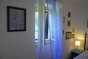 Łóżko lub łóżka w pokoju w obiekcie Rustic House Miketa - Family Summertime