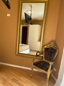 A seating area at Villa Castello only room