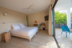 Postel nebo postele na pokoji v ubytování Boutik Hôtel 2A - Adult Only