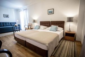 Posteľ alebo postele v izbe v ubytovaní Rooms Margarita