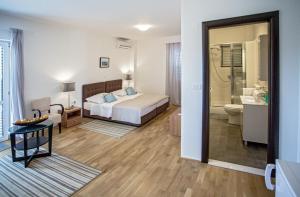 Posteľ alebo postele v izbe v ubytovaní Rooms Margarita