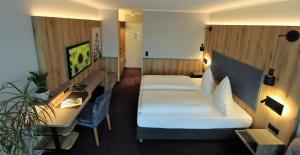 TV a/nebo společenská místnost v ubytování Hotel Thormählen