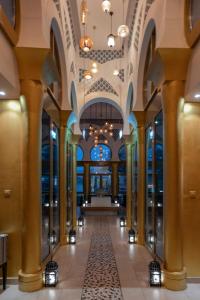
a very large room with a lot of windows at Oaks Ibn Battuta Gate Dubai in Dubai
