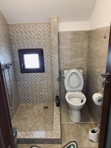 Kylpyhuone majoituspaikassa Casa Loredana