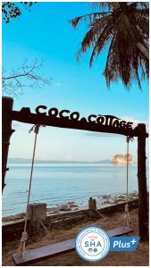 a view of the ocean from the beach at Coco Cottage - SHA Plus in Ko Ngai