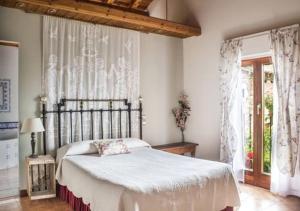 Postel nebo postele na pokoji v ubytování El Patio de la Morera I