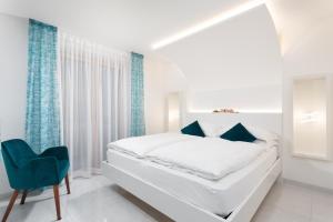 Postel nebo postele na pokoji v ubytování Hotel Pareda + 37 fotografií